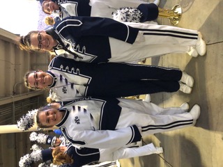 Three sisters, Emily, Sarah and Megan Rogers play together in the BYU marching band.