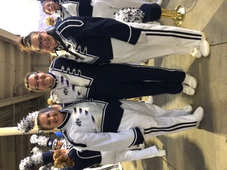 Three sisters, Emily, Sarah and Megan Rogers play together in the BYU marching band.