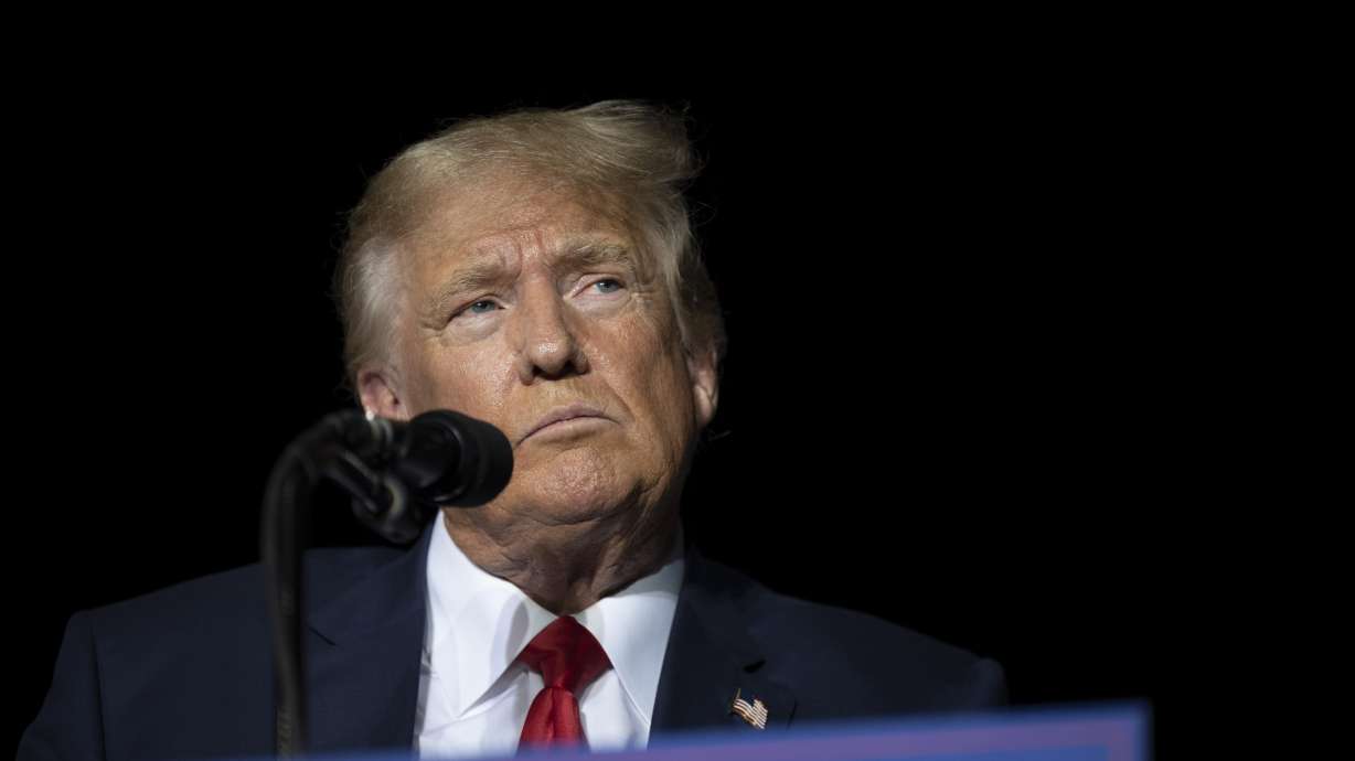 Former President Donald Trump pauses while speaking at a rally at the Minden Tahoe Airport in Minden, Nev., on Oct. 8. It’s taken just three days to seat a jury of 12 people in the tax fraud trial of Donald Trump’s company — surprising even some people involved in the case who thought it would take at least a week.