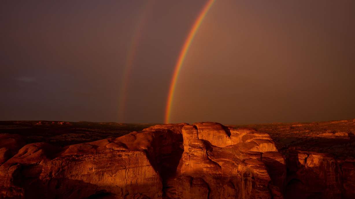 A double rainbow is pictured in the sky at Arches National Park near Moab on Sept. 18, 2021. Utah has been named an “adventurer’s dream destination,” by one magazine listing.