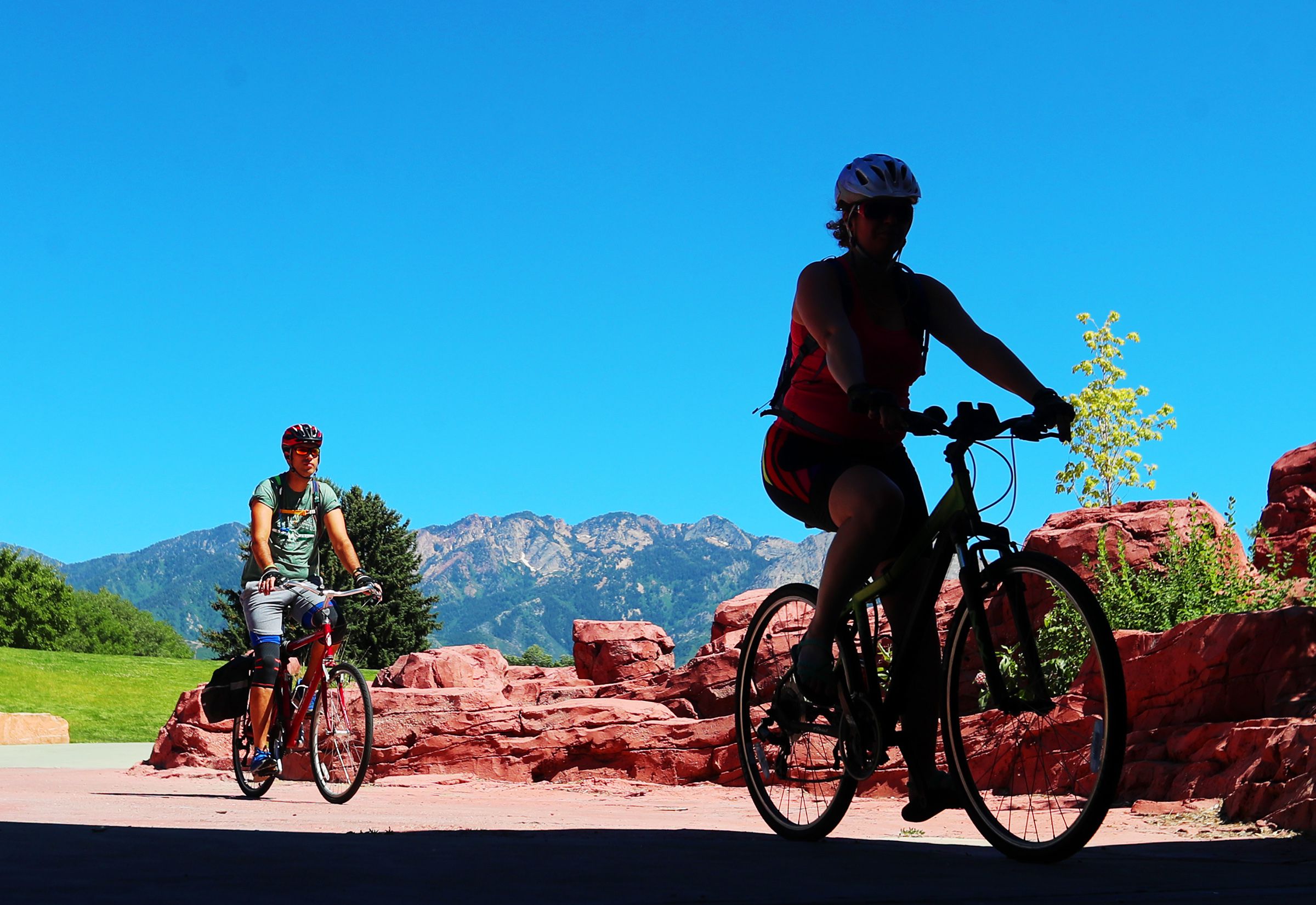 A pair of bicyclists go into the tunnel under 1300 East at Sugar House Park in Salt Lake City on June 22, 2020.