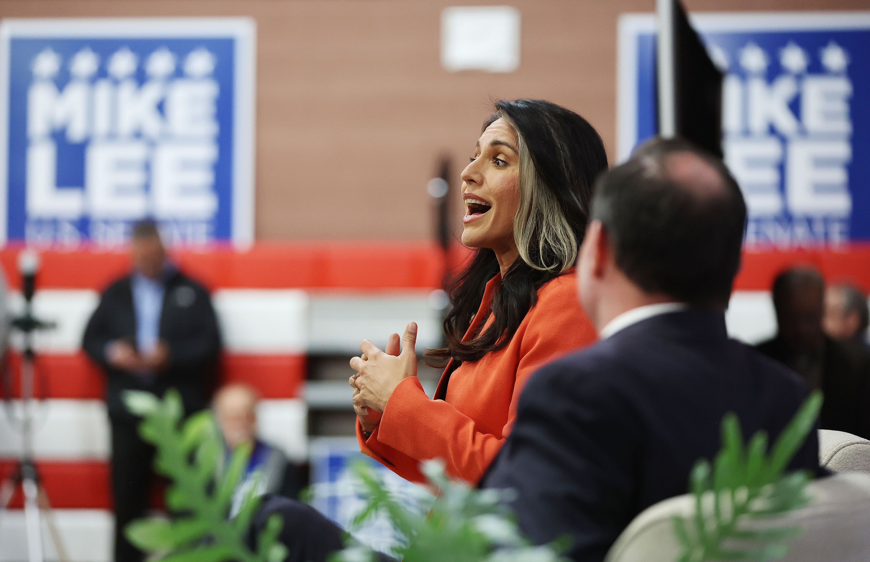 Former Democratic Rep. Tulsi Gabbard, D-Hawaii, campaigns for Sen. Mike Lee, R-Utah, during a rally at the American Preparatory Academy in Draper on Thursday.