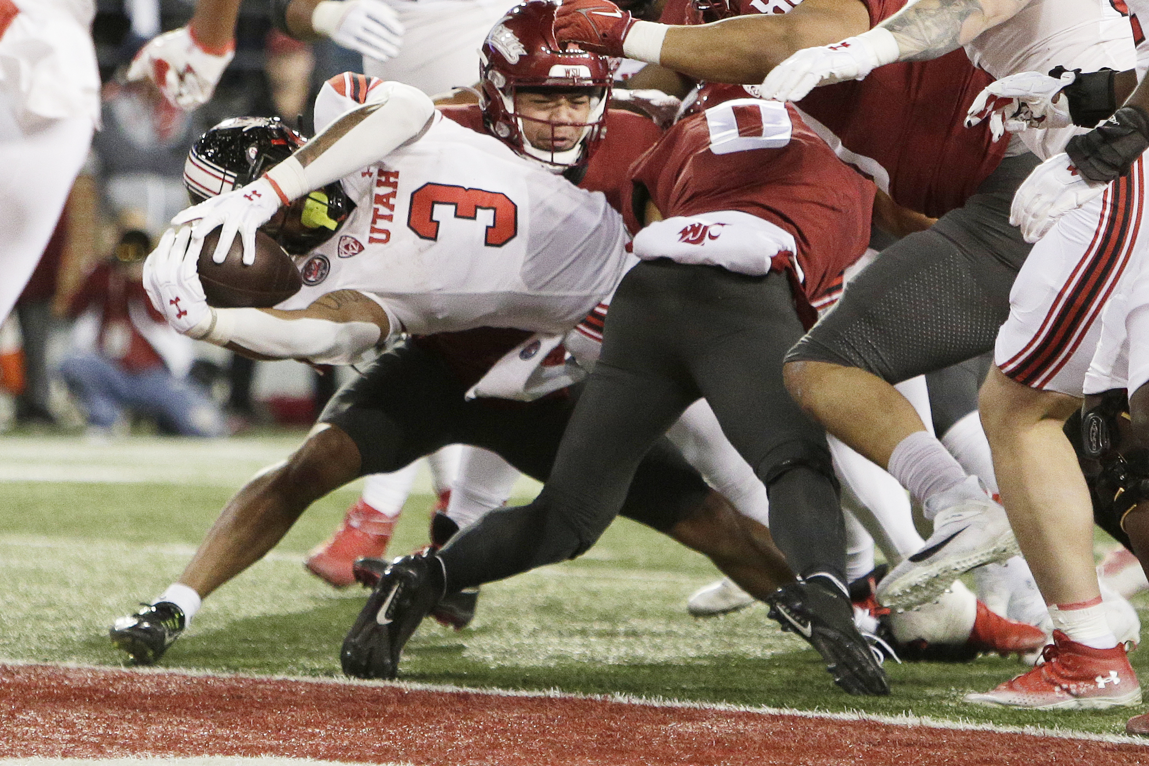 Utah running back Ja'Quinden Jackson (3) reaches for a touchdown during the first half of an NCAA college football game against Washington State, Thursday, Oct. 27, 2022, in Pullman, Wash.