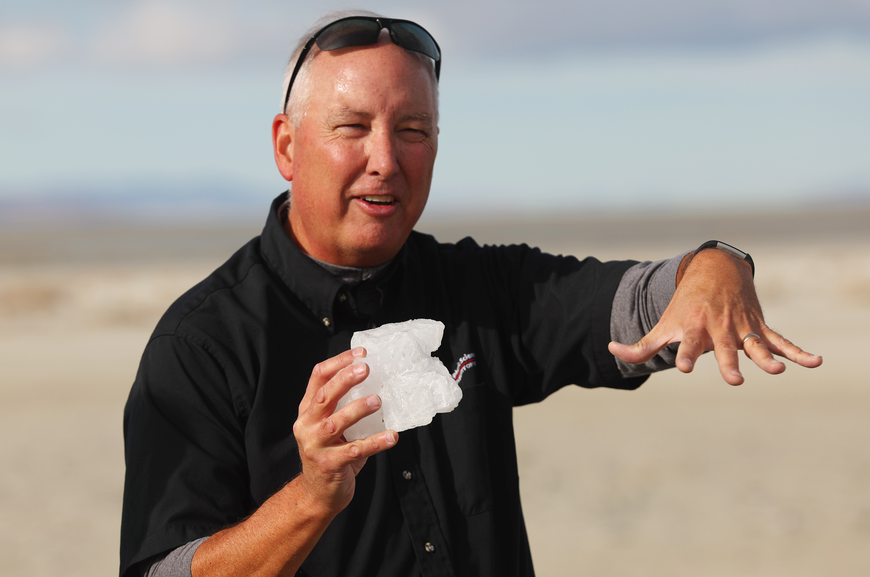 Kevin Perry, professor of atmospheric sciences at the University of Utah, talks with a group of students and teachers from Horizonte High in Salt Lake City as they take a trip to Antelope Island to gain first hand knowledge of the situation with the low water levels and the effects on the air quality on Thursday, Oct. 27.