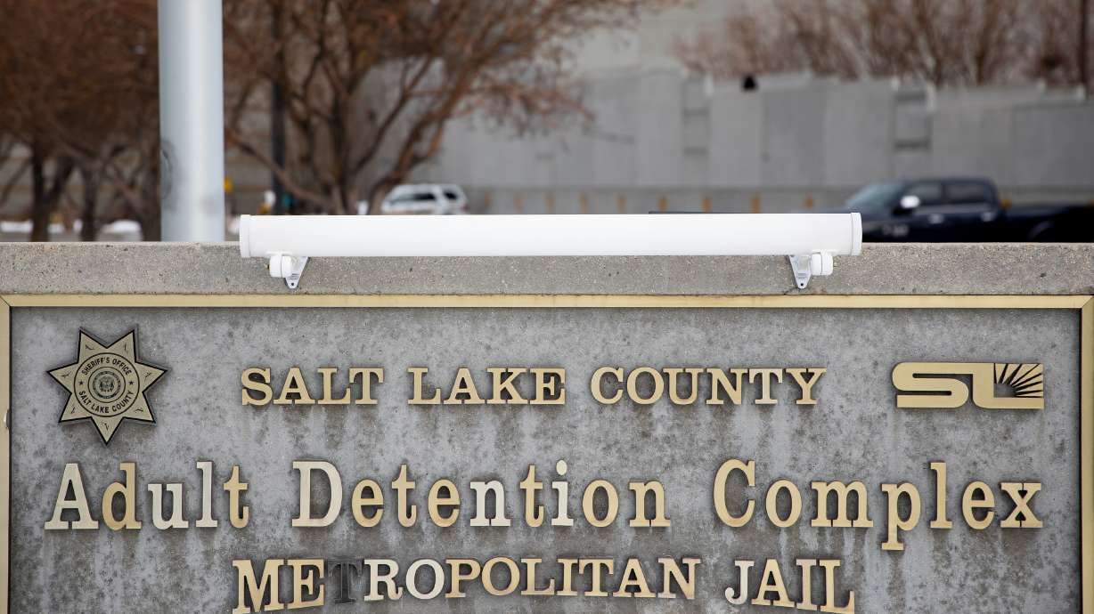 A man who was convicted 10 years ago of causing an officer to fall off a roof while trying to escape is facing new charges for a similar incident last year.