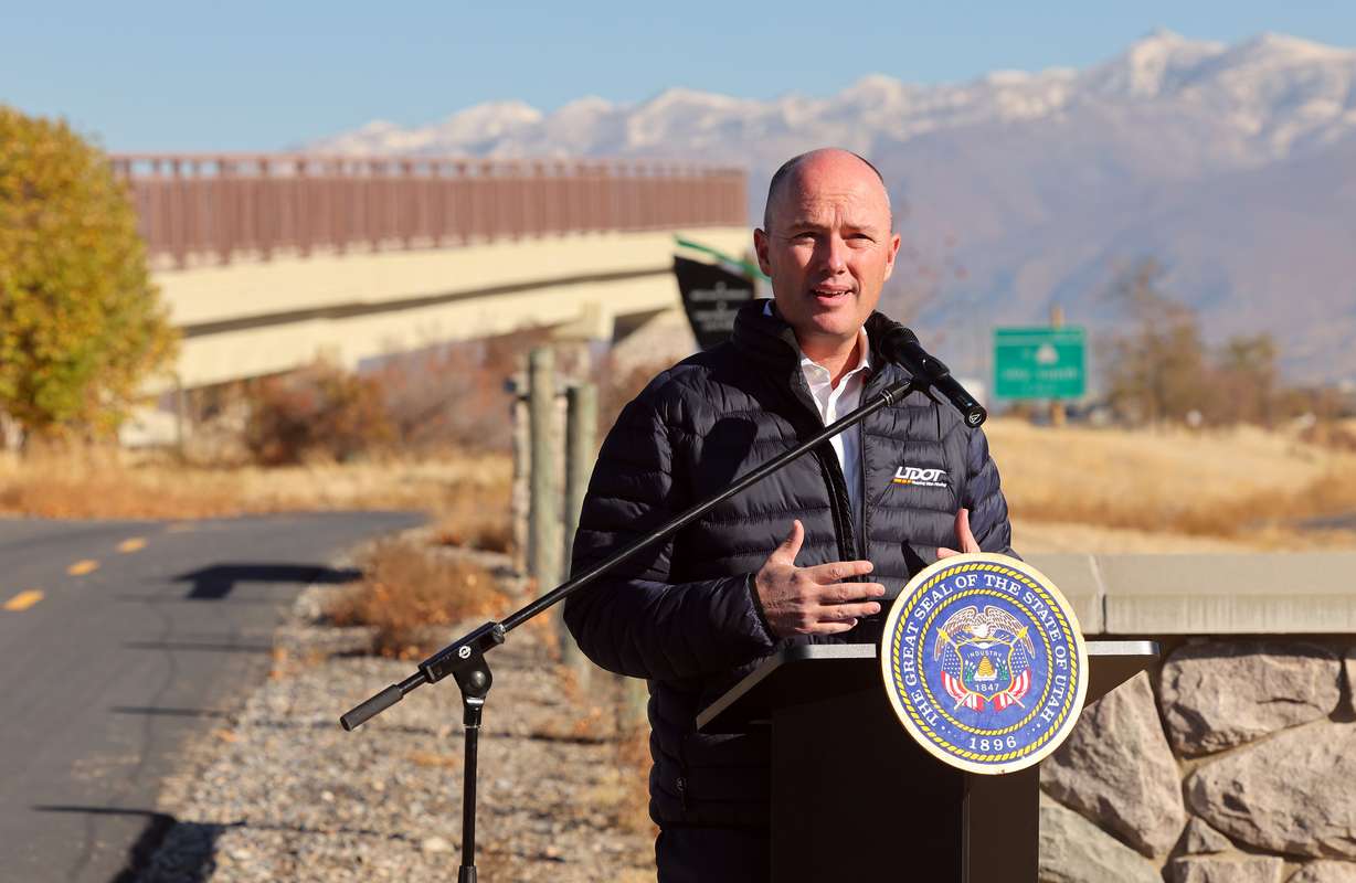 Gov. Spencer Cox speaks as he joins UDOT executive director Carlos Braceras in announcing the vision for state-wide trail systems at a press conference in Woods Cross on Friday, Oct. 28, 2022.