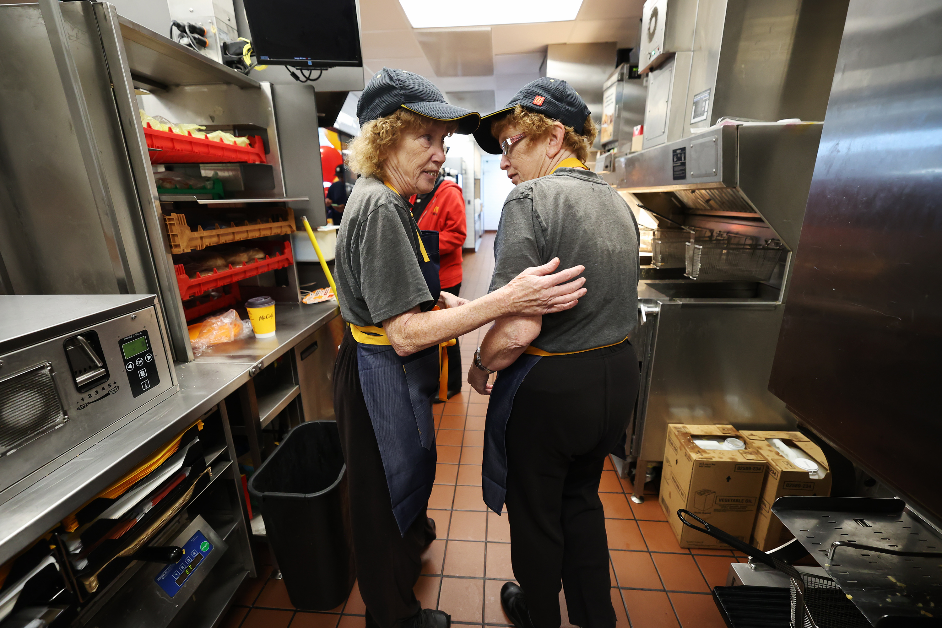 Ellen and Elaine Hamilton, McDonald’s crew members show some of their work areas at the 3300 S. Main Street location in Salt Lake City, where the two have worked for 40 years and were recognized on Friday.