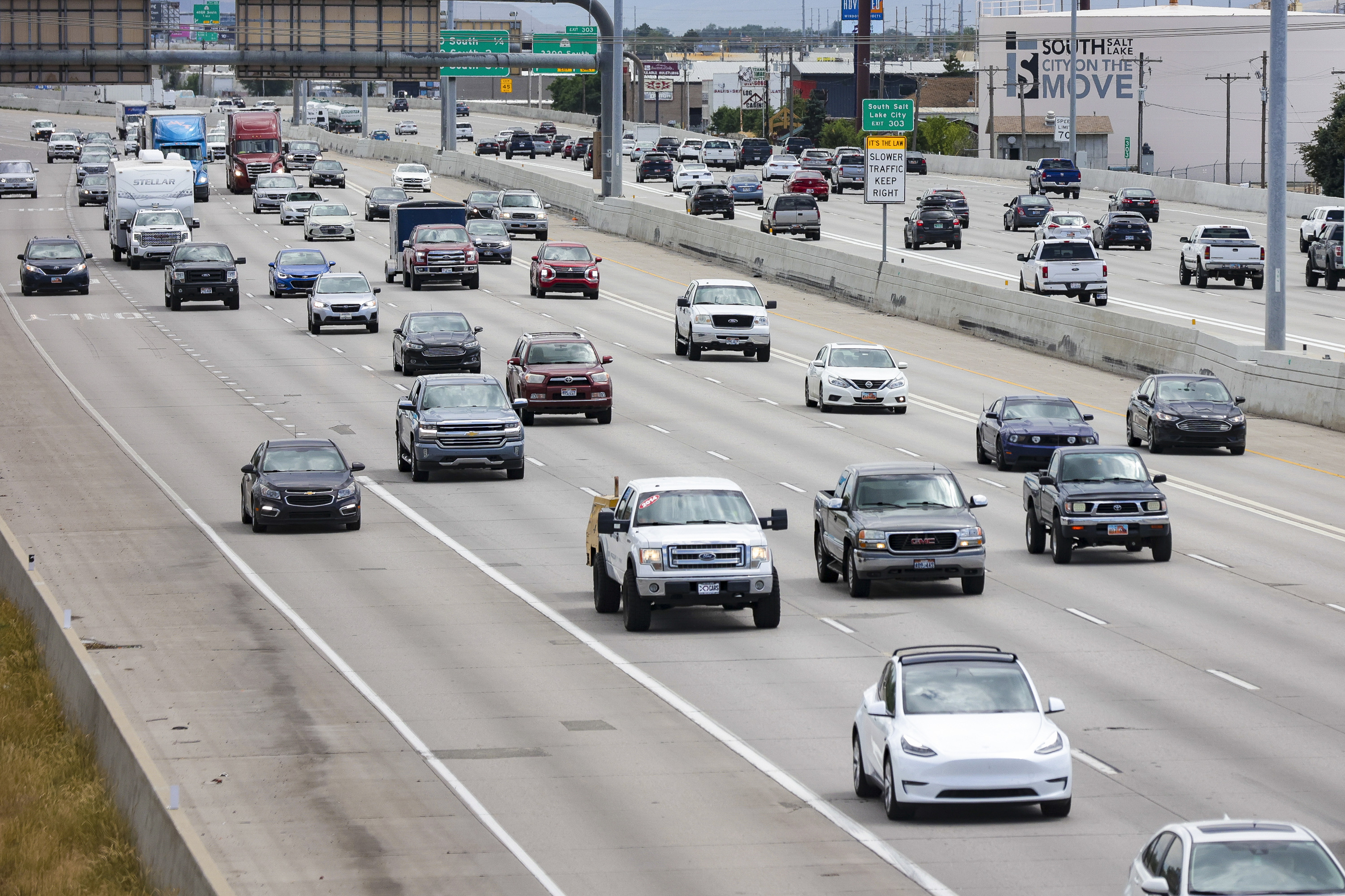 Traffic moves along I-15 during rush hour in Salt Lake City on July 1. Ten more miles of the express lanes will be open in Davis and Weber counties beginning Monday. 