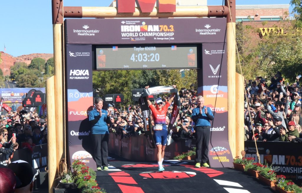 Winner Taylor Knibb crosses the finish line of the Ironman 70.3 World Championship, St. George, Friday.