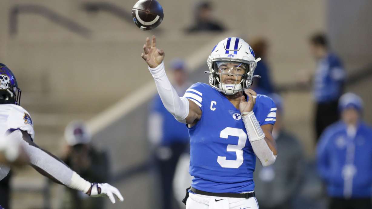 BYU quarterback Jaren Hall (3) throws the ball while playing the East Carolina's Pirates in a NCAA college football game Friday, Oct. 28, 2022, in Provo, Utah.