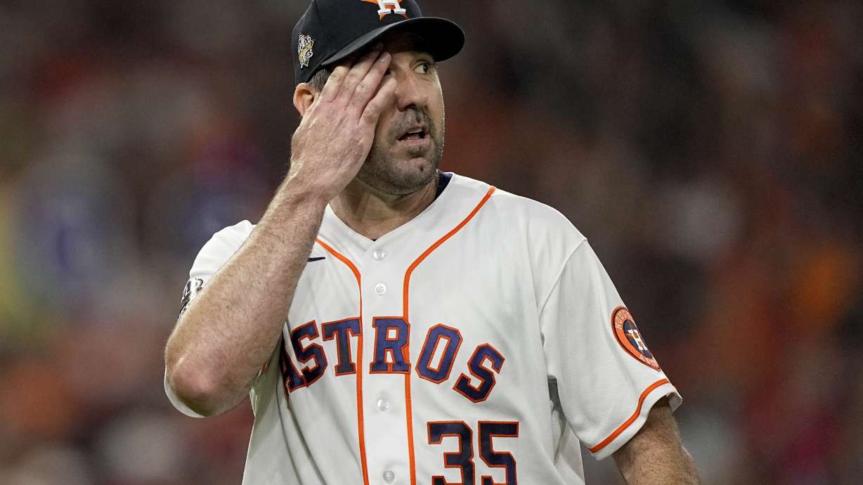 Houston Astros starting pitcher Justin Verlander walks to the dugout after the top of the first inning in Game 1 of baseball's World Series between the Houston Astros and the Philadelphia Phillies on Friday, Oct. 28, 2022, in Houston.