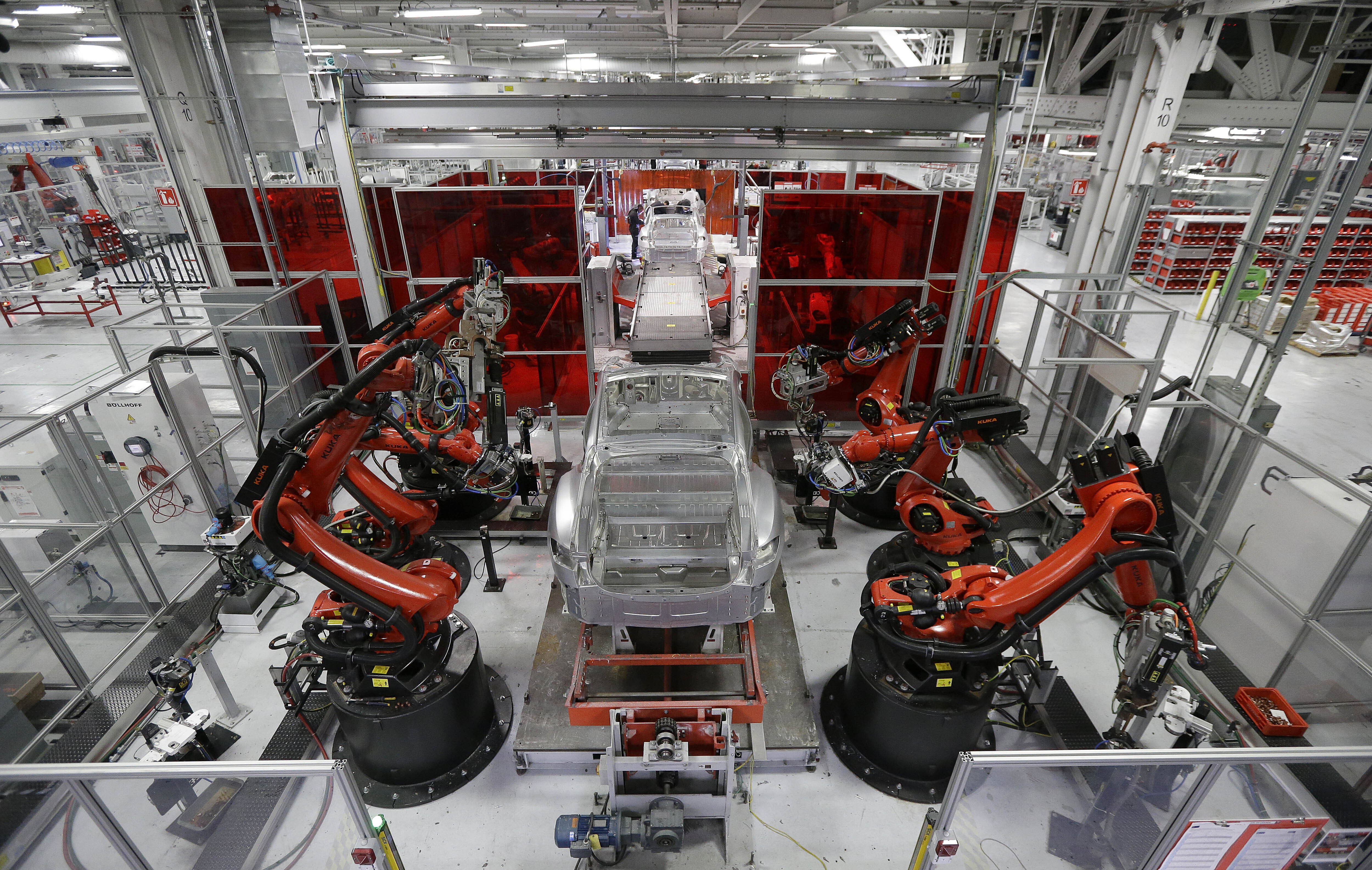 Kuka robots work on Tesla Model S cars in the Tesla factory in Fremont, Calif. Tesla said in documents posted Saturday by the U.S. National Highway Traffic Safety Administration that the glitch may affect one or both taillights on certain Model 3 and Model Y vehicles.