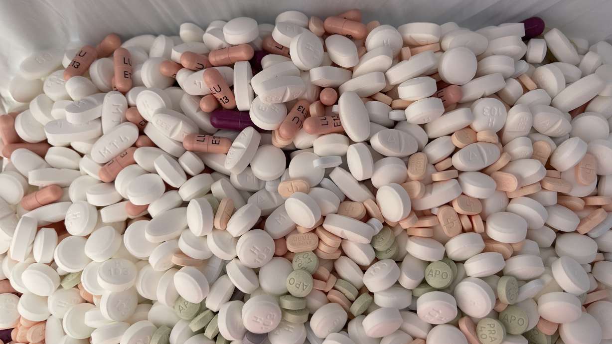 Prescription drugs are collected in a bag during the National Prescription Drug Take Back Day event at St. Mark's Hospital in Millcreek on Saturday. In an effort to mitigate the opioid crisis, many Utah law enforcement agencies on Saturday participated in the National Prescription Drug Take Back Day.