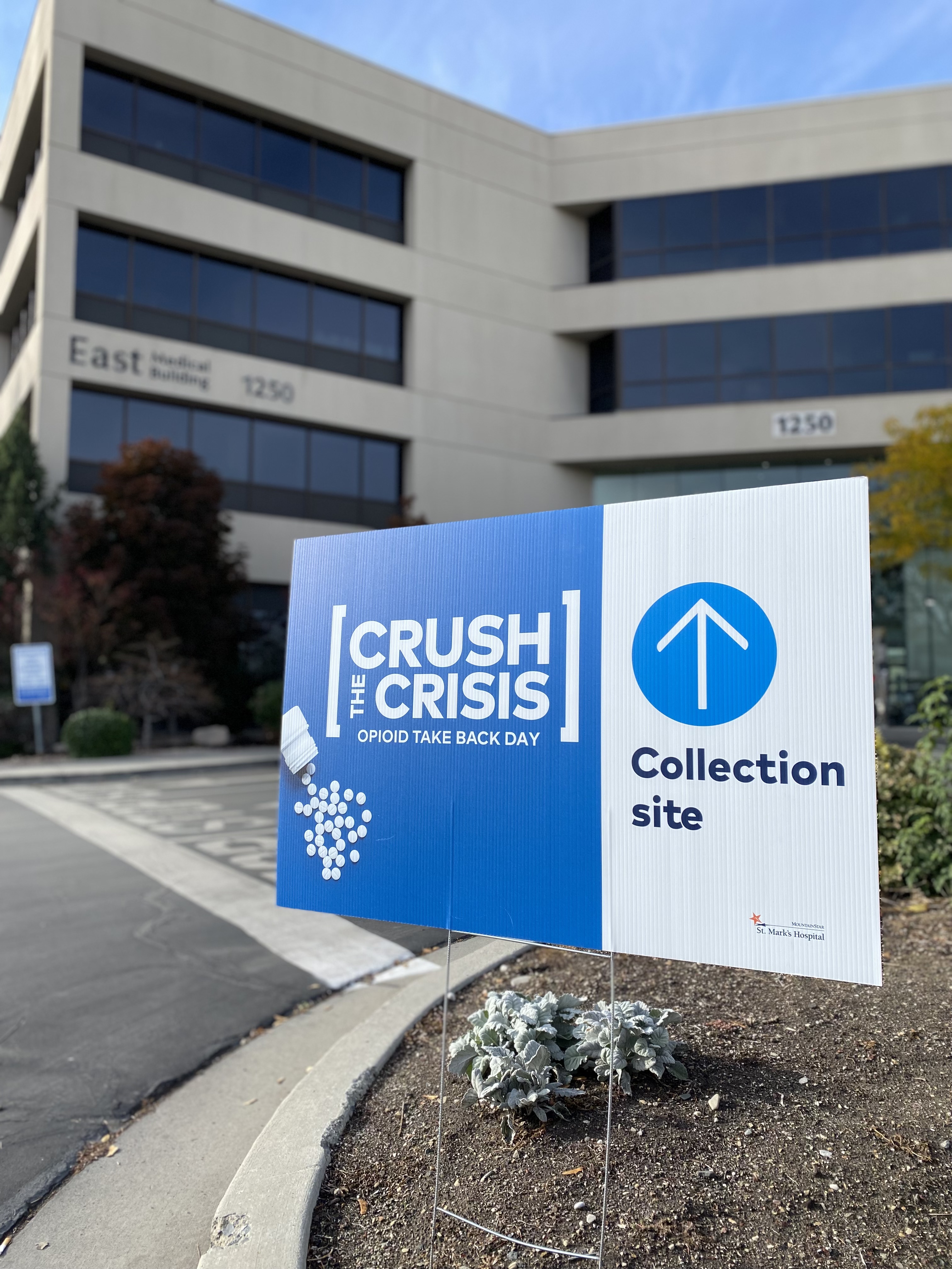 A "Crush the Crisis" sign is pictured at St. Marks Hospital in Millcreek on Saturday. In an effort to mitigate the opioid crisis, many Utah law enforcement agencies on Saturday participated in the National Prescription Drug Take Back Day.