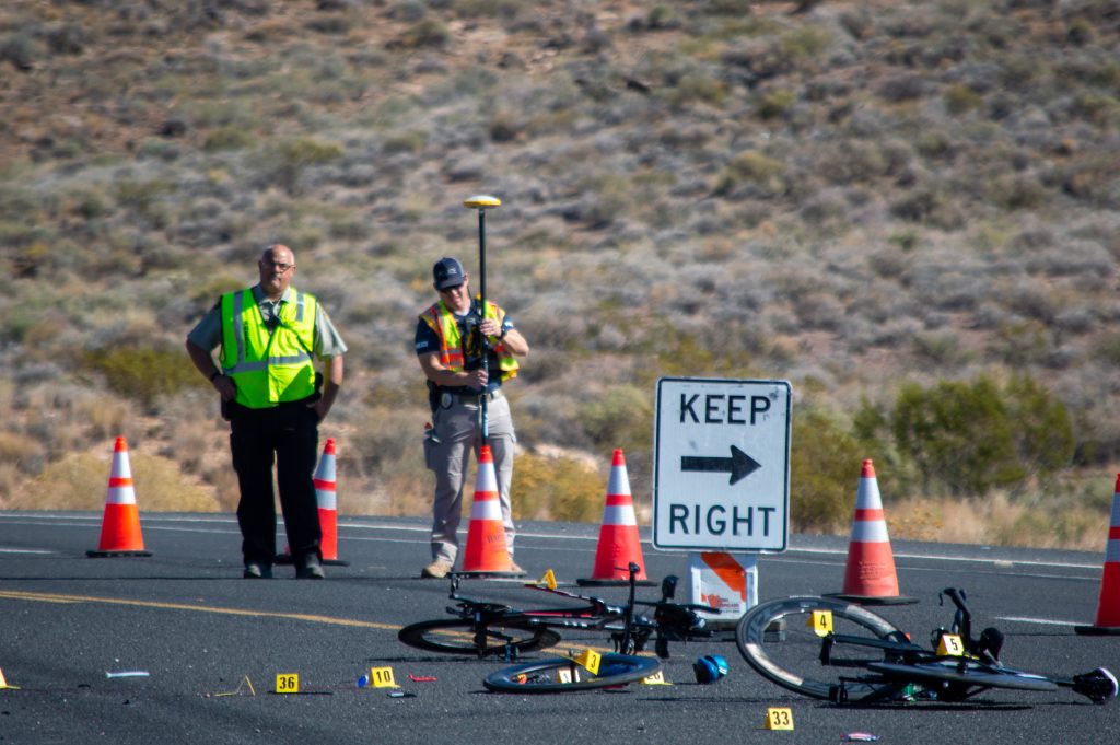 Two Iron Man competitors were involved in a collision with a vehicle near the Ghost Bike Memorial on Telegraph Street, in Washington, on Saturday, officials say.