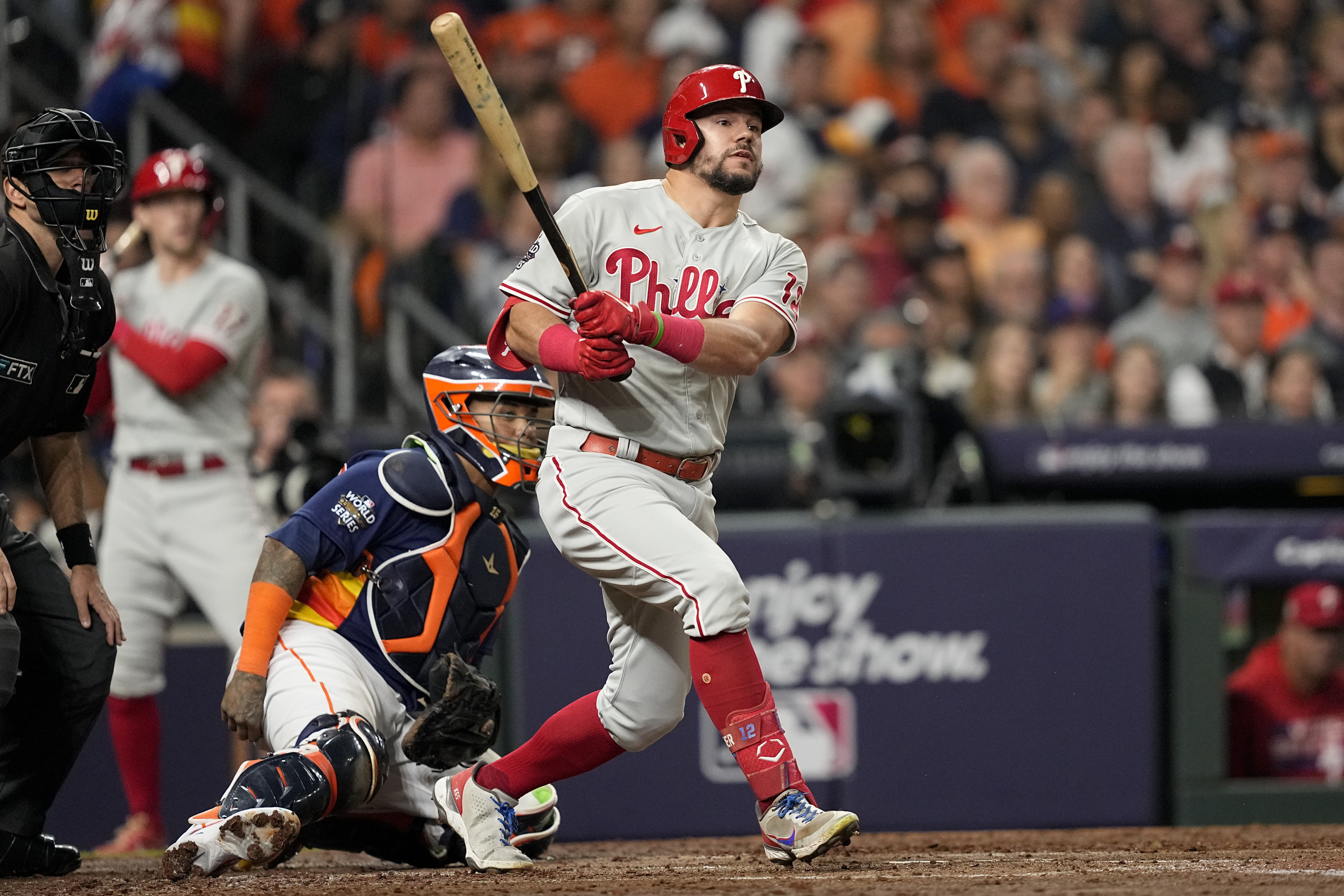 Philadelphia Phillies' Kyle Schwarber runs after hitting a single during the third inning in Game 2 of baseball's World Series between the Houston Astros and the Philadelphia Phillies on Saturday, Oct. 29, 2022, in Houston. 