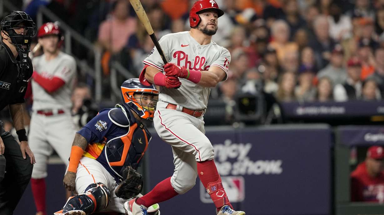 Philadelphia Phillies' Kyle Schwarber runs after hitting a single during the third inning in Game 2 of baseball's World Series between the Houston Astros and the Philadelphia Phillies on Saturday, Oct. 29, 2022, in Houston.