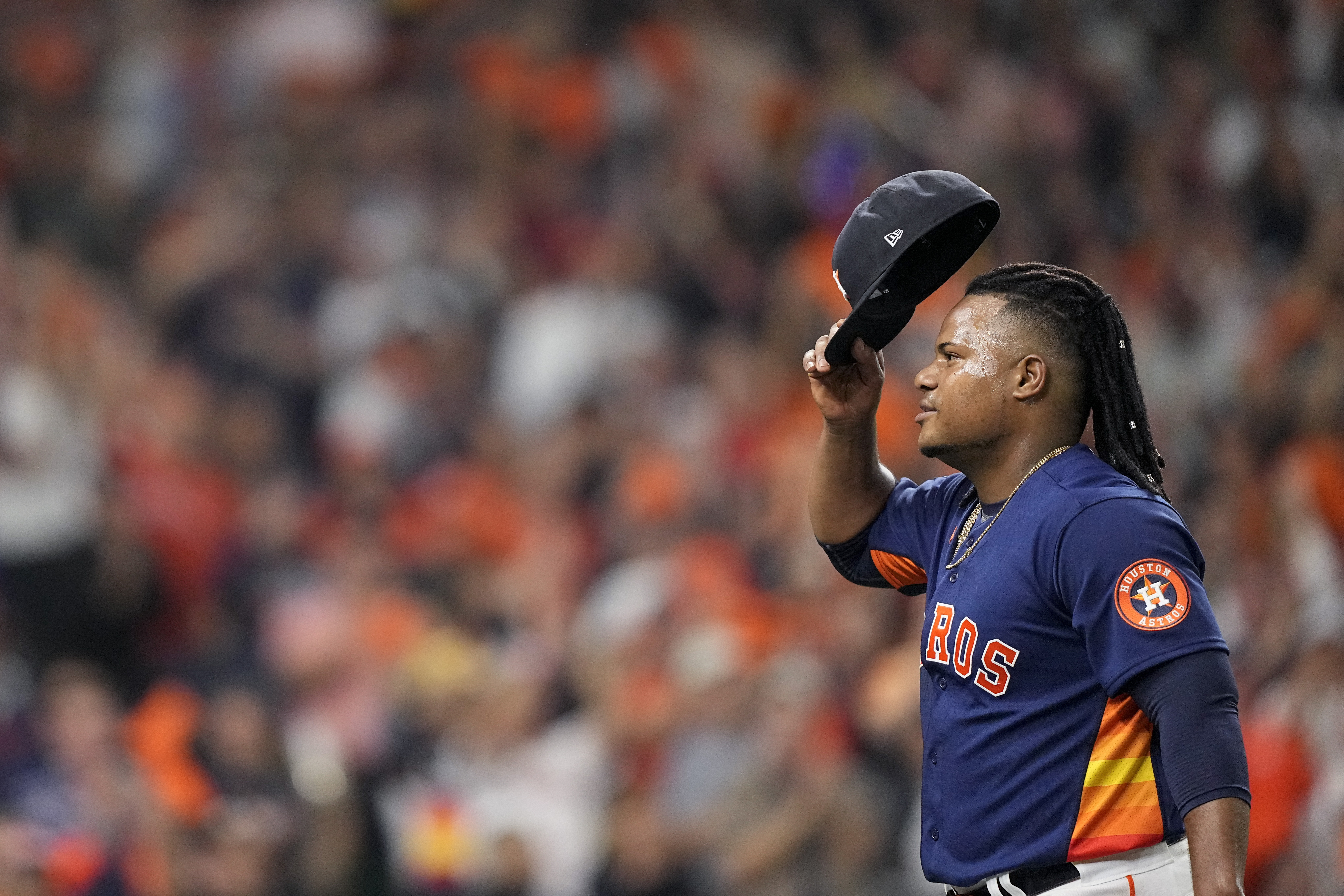 Houston Astros starting pitcher Framber Valdez tips his cap as he leaves the game during the seventh inning in Game 2 of baseball's World Series between the Houston Astros and the Philadelphia Phillies on Saturday, Oct. 29, 2022, in Houston. 