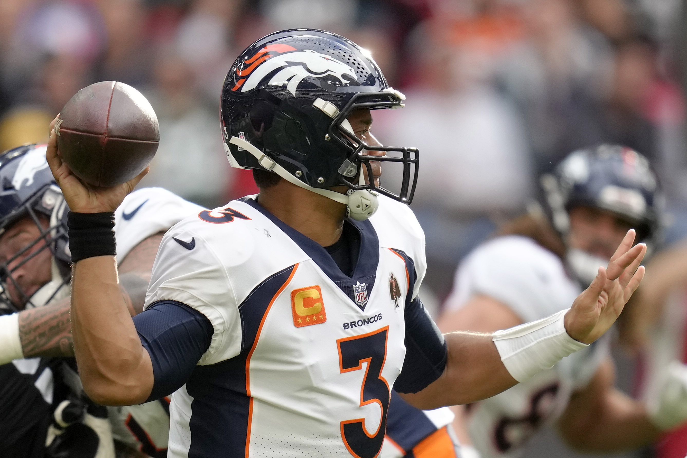 Denver Broncos quarterback Russell Wilson (3) throws the ball during the NFL football game between Denver Broncos and Jacksonville Jaguars at Wembley Stadium London, Sunday, Oct. 30, 2022. 