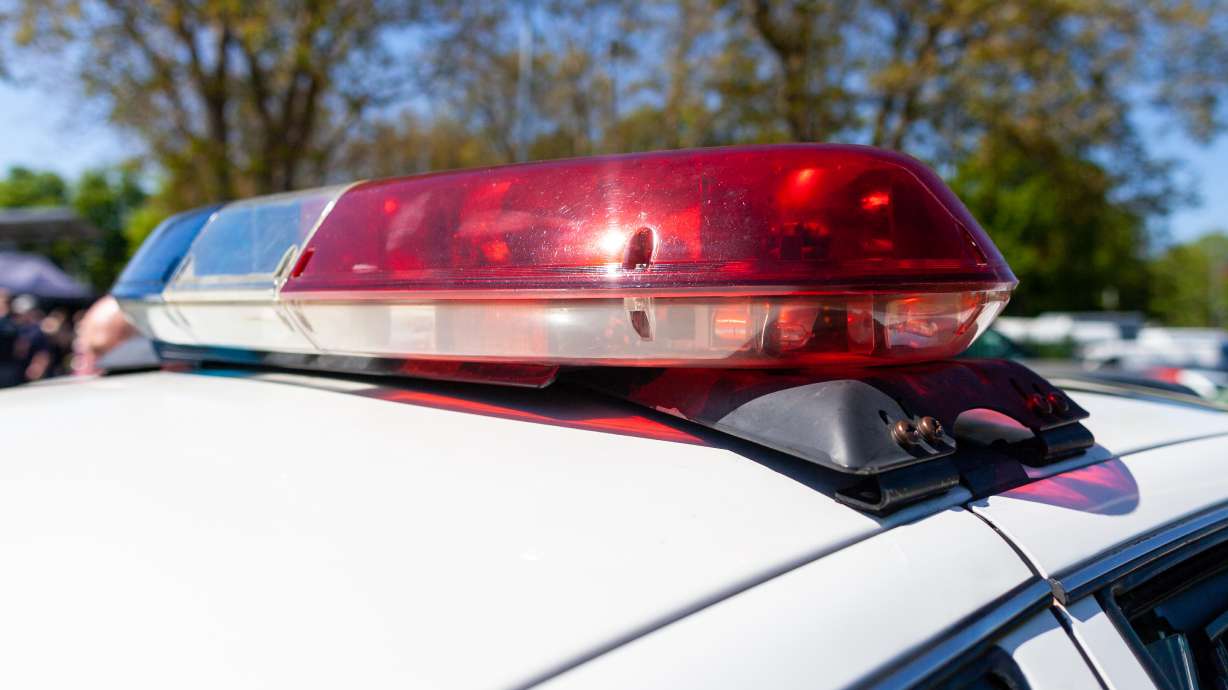 A driver has been arrested following a collision between a car and two bicyclists participating in the Ironman 70.3 World Championship in St. George on Saturday, police say.