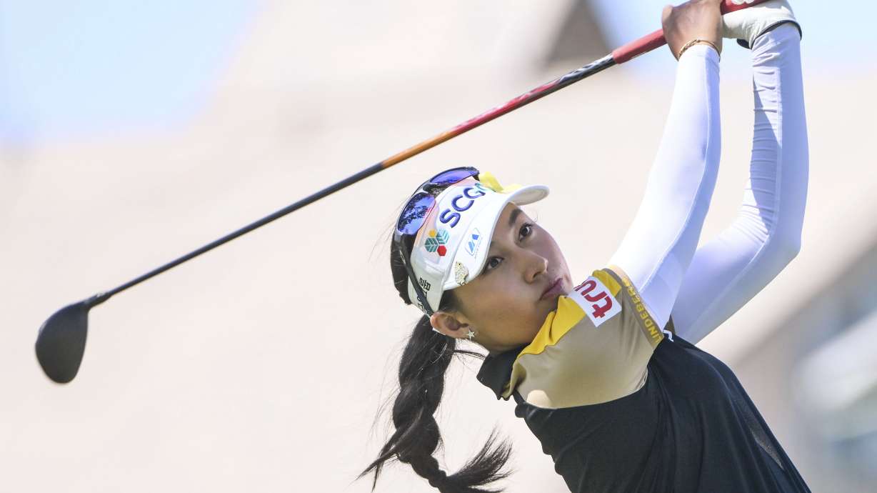 FILE - Atthaya Thitikul of Thailand watches her shot on the 16th hole during the LPGA Walmart NW Arkansas Championship golf tournament on Sept. 25, 2022, in Rogers, Ark. Atthaya Thitikul shot a 9-under 63 on Thursday, Oct. 20, to lead after the first round of the LPGA BMW Ladies Championship in South Korea. She was a stroke ahead of Minsol Kim and three up on a trio of players: A Lim Kim, Andrea Lee, and Yaeeun Hong.