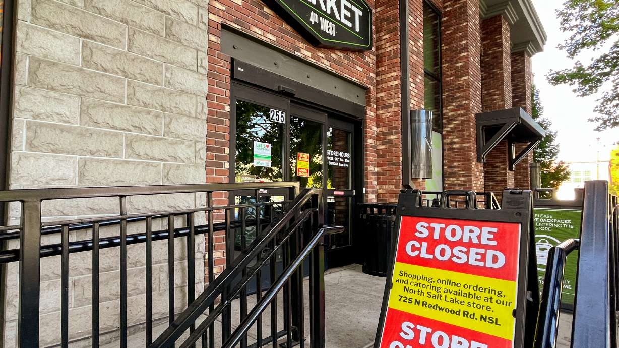 A photo of a sign informing Lee's Marketplace at 4th West customers of the business's closure is pictured on Oct. 30, 2022. Lee's Marketplace announced Thursday that the store will reopen next week.