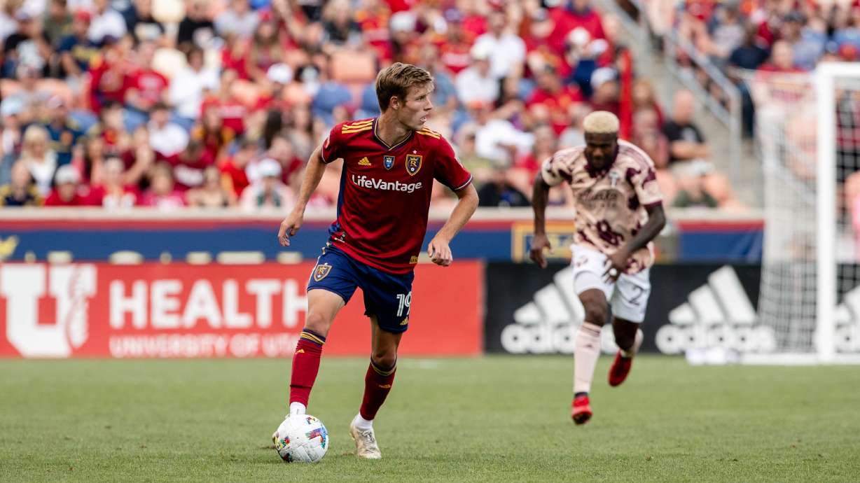 Bode Hidalgo dribbles against Portland at America First Field.
