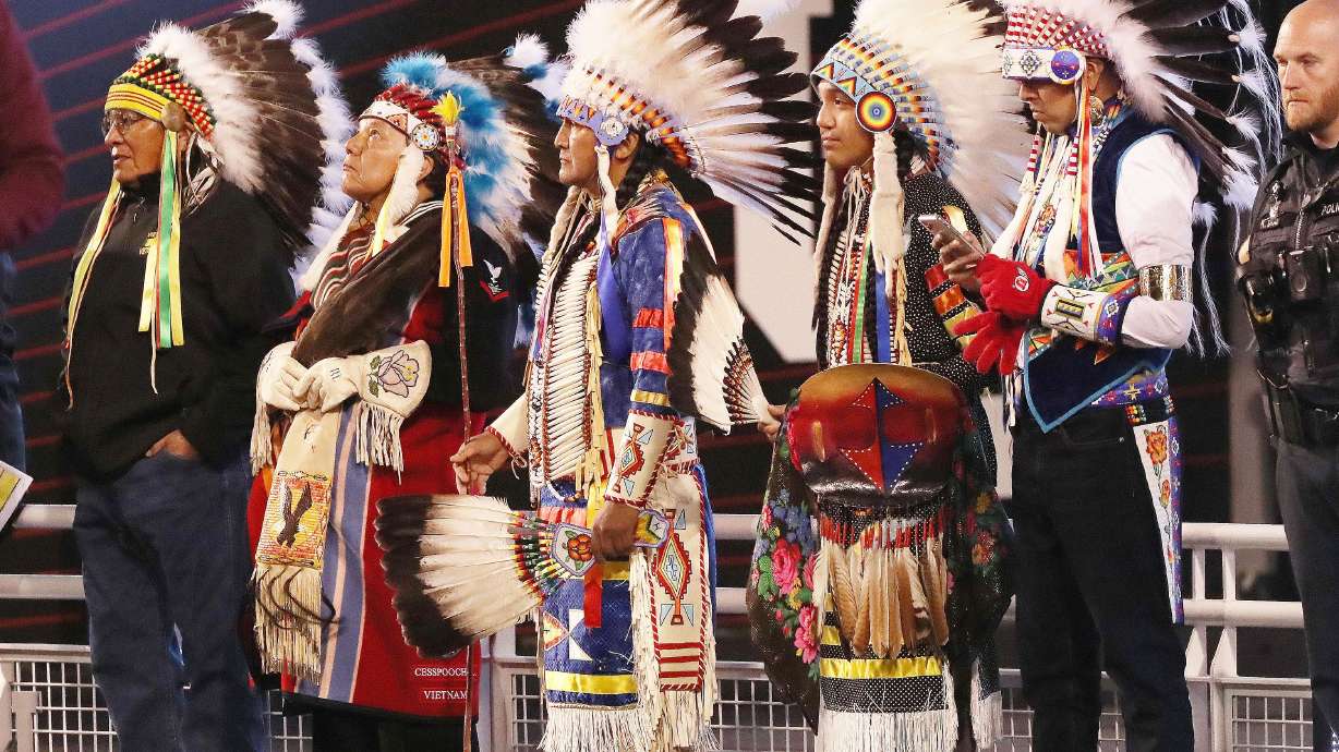 The Ute tribe prepares to perform at halftime in Salt Lake City on Oct. 16, 2021, at Rice Eccles Stadium.