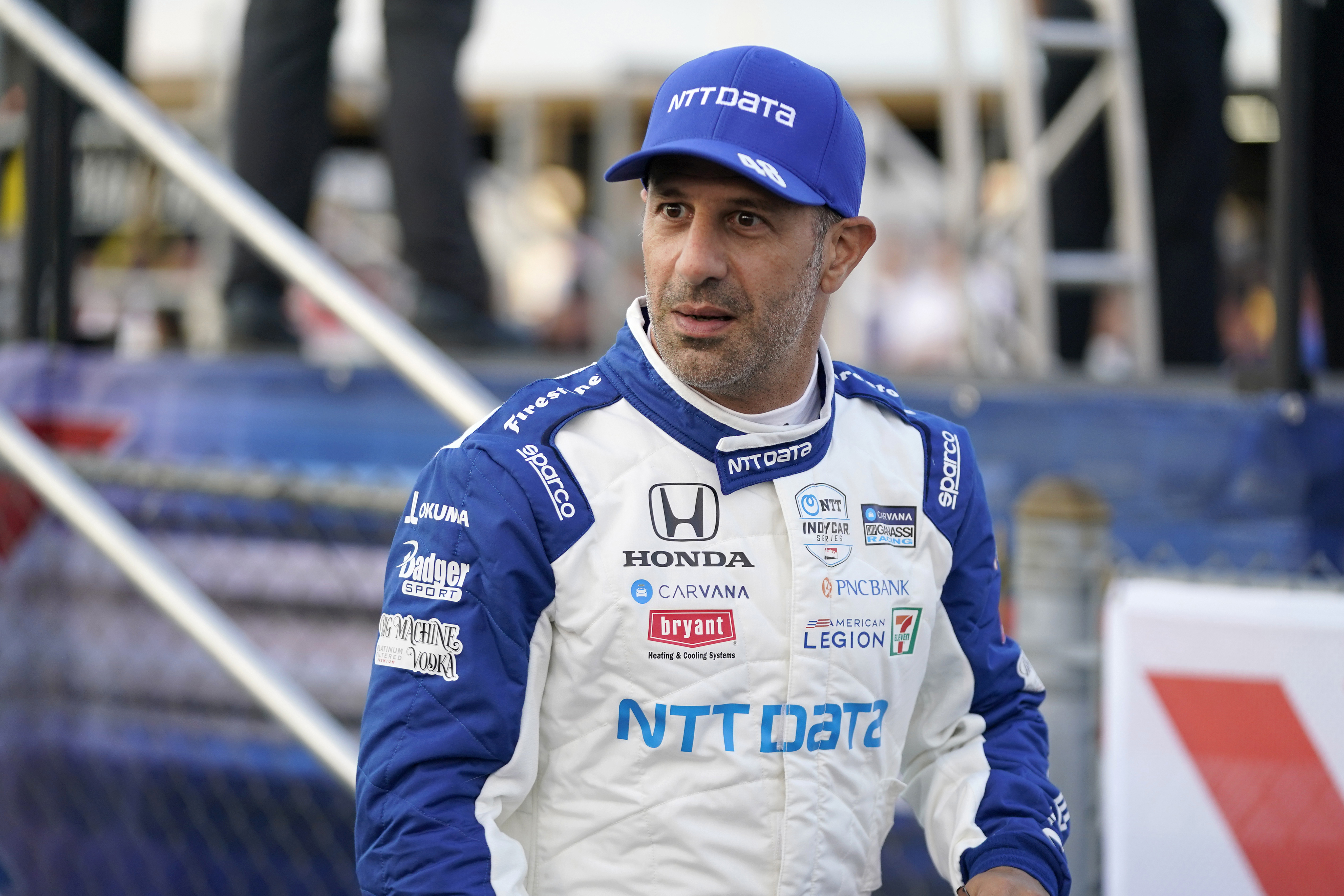 FILE - Tony Kanaan is shown before the start an IndyCar auto race at World Wide Technology Raceway on Saturday, Aug. 21, 2021, in Madison, Ill. The tit-for-tat war between Zak Brown and Chip Ganassi took another turn Tuesday, Nov. 1, 2022, when Arrow McLaren SP announced it had signed both a Ganassi sponsor and Tony Kanaan to drive the Indianapolis 500. 