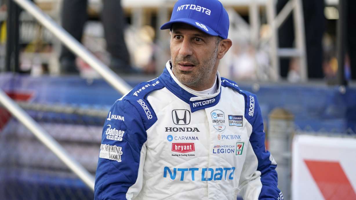 FILE - Tony Kanaan is shown before the start an IndyCar auto race at World Wide Technology Raceway on Saturday, Aug. 21, 2021, in Madison, Ill. The tit-for-tat war between Zak Brown and Chip Ganassi took another turn Tuesday, Nov. 1, 2022, when Arrow McLaren SP announced it had signed both a Ganassi sponsor and Tony Kanaan to drive the Indianapolis 500.