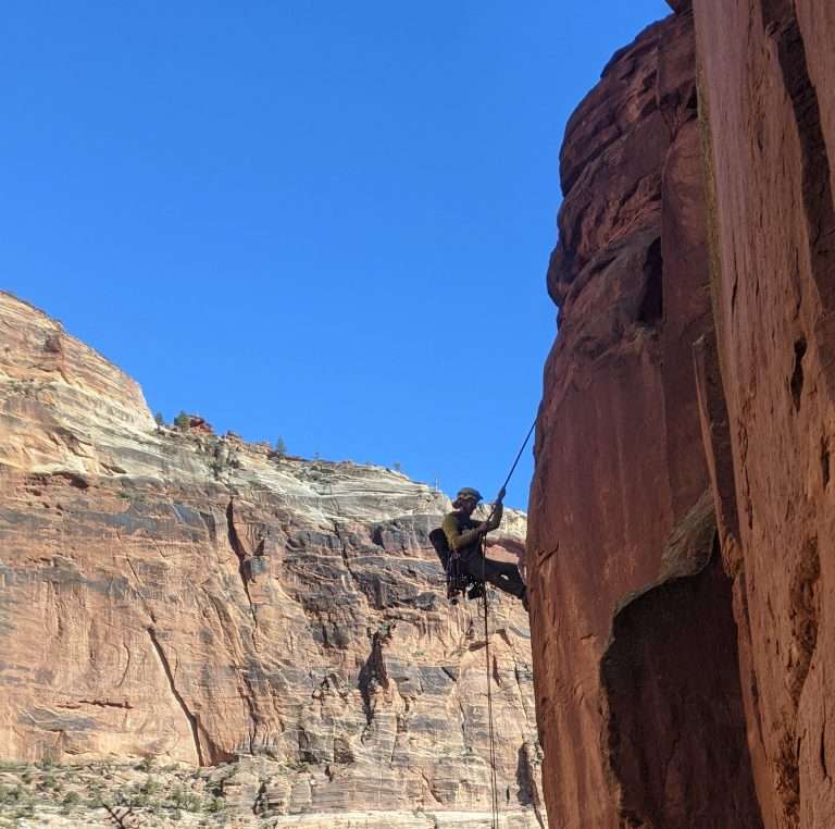 Zachary Warren a biologist for Bat Conservation International, seeks out hibernating bats for research, Zion National Park, Utah.