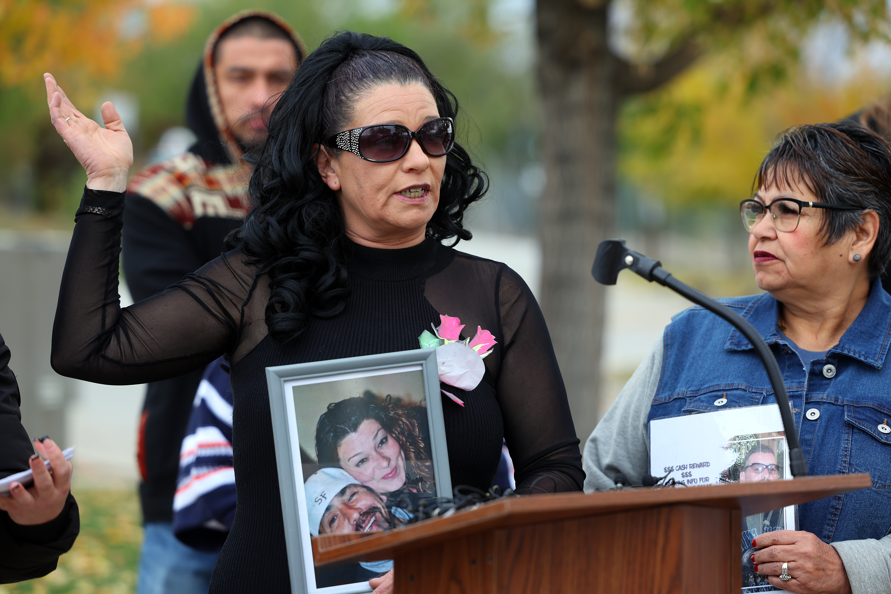 Heather Ramos holds a photo of her husband, Joseph Salas, during a press conference near North Temple and the Jordan River in Salt Lake City on Tuesday. Salas’ body was found in the Jordan River more than a year ago, and his family is asking for help in finding answers in his death.