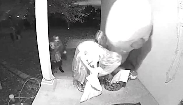 Doorbell camera video shows trick-or-treaters at the Cavanaugh home in Layton Monday.