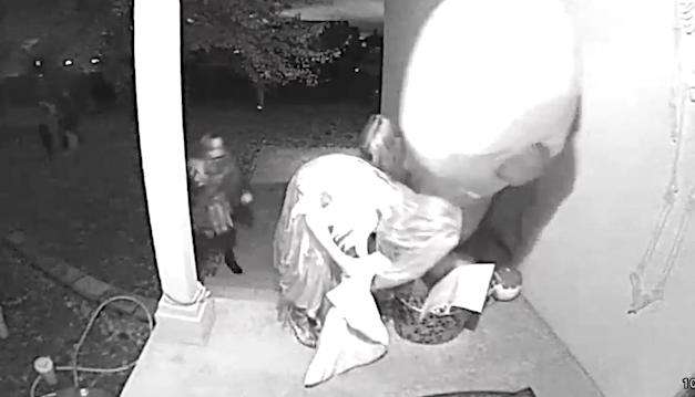 Doorbell camera video shows trick-or-treaters at the Cavanaugh home in Layton Monday.