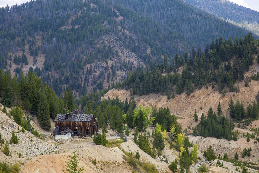 The last standing building above the Yellow Pine Pit open-pit gold mine in the Stibnite Mining District in central Idaho, Sept. 19, 2018. The U.S. Forest Service on Friday, Oct. 28, made public an environmental study for British Columbia-based Perpetua Resources' Stibnite Gold Project about 40 miles east of McCall.