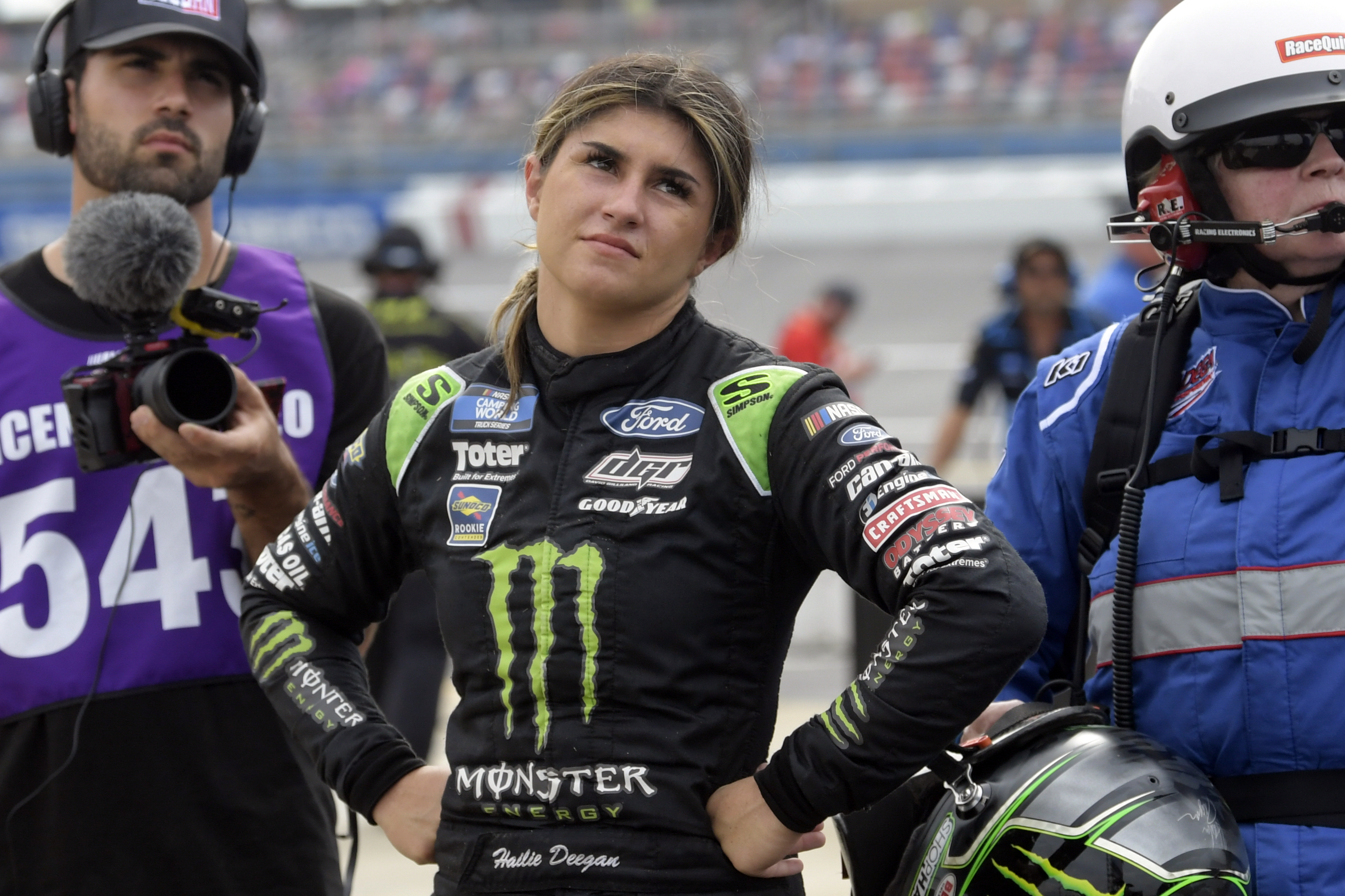 FILE - Hailie Deegan watches a screen after crashing during the NASCAR Truck Series auto race, Saturday, Oct. 2, 2021, in Talladega, Ala. Deegan heads into the Truck Series finale unsure of what she'll drive next season. 