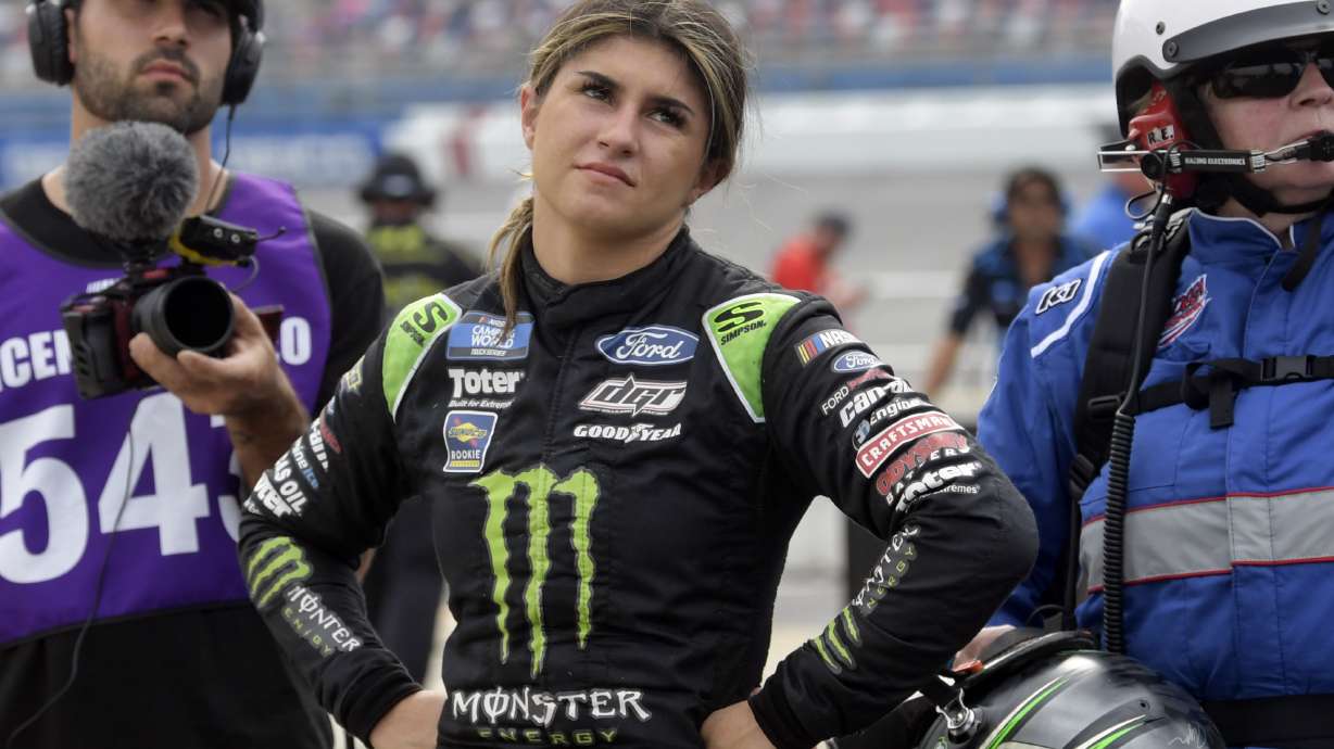 FILE - Hailie Deegan watches a screen after crashing during the NASCAR Truck Series auto race, Saturday, Oct. 2, 2021, in Talladega, Ala. Deegan heads into the Truck Series finale unsure of what she'll drive next season.