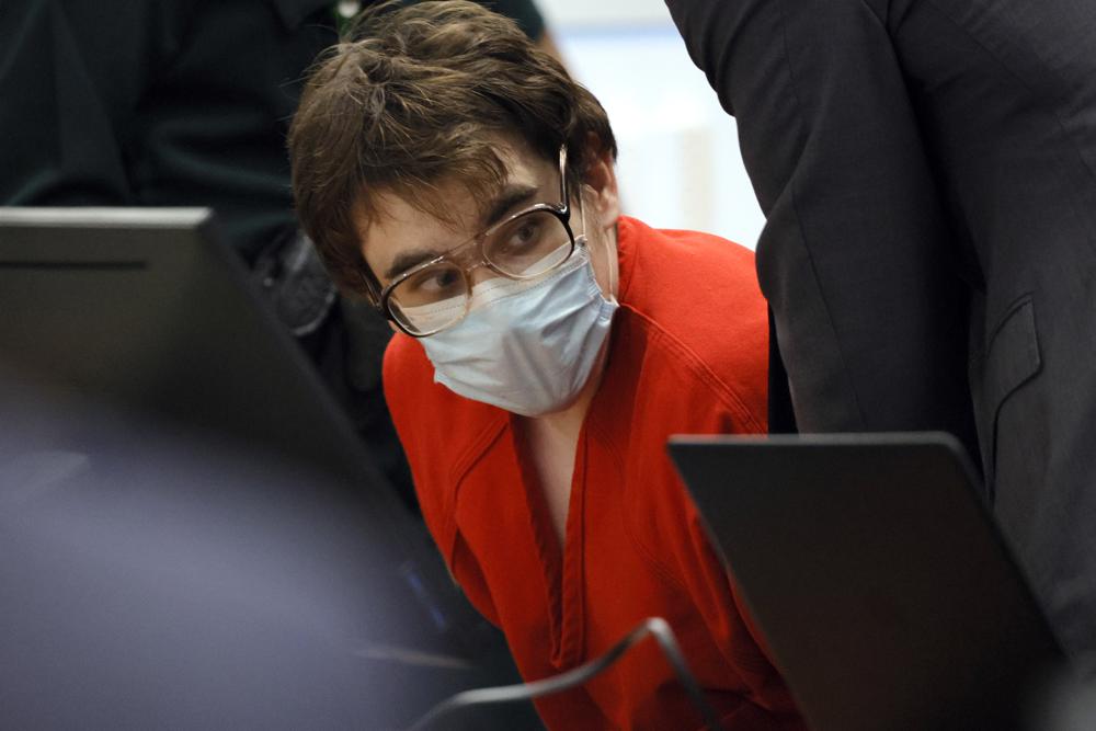 Marjory Stoneman Douglas High School shooter Nikolas Cruz is seated at the defense table for a sentencing hearing at the Broward County Courthouse in Fort Lauderdale, Fla., on Wednesday. Cruz was sentenced to life in prison for murdering 17 people at Parkland's Marjory Stoneman Douglas High School more than four years ago.