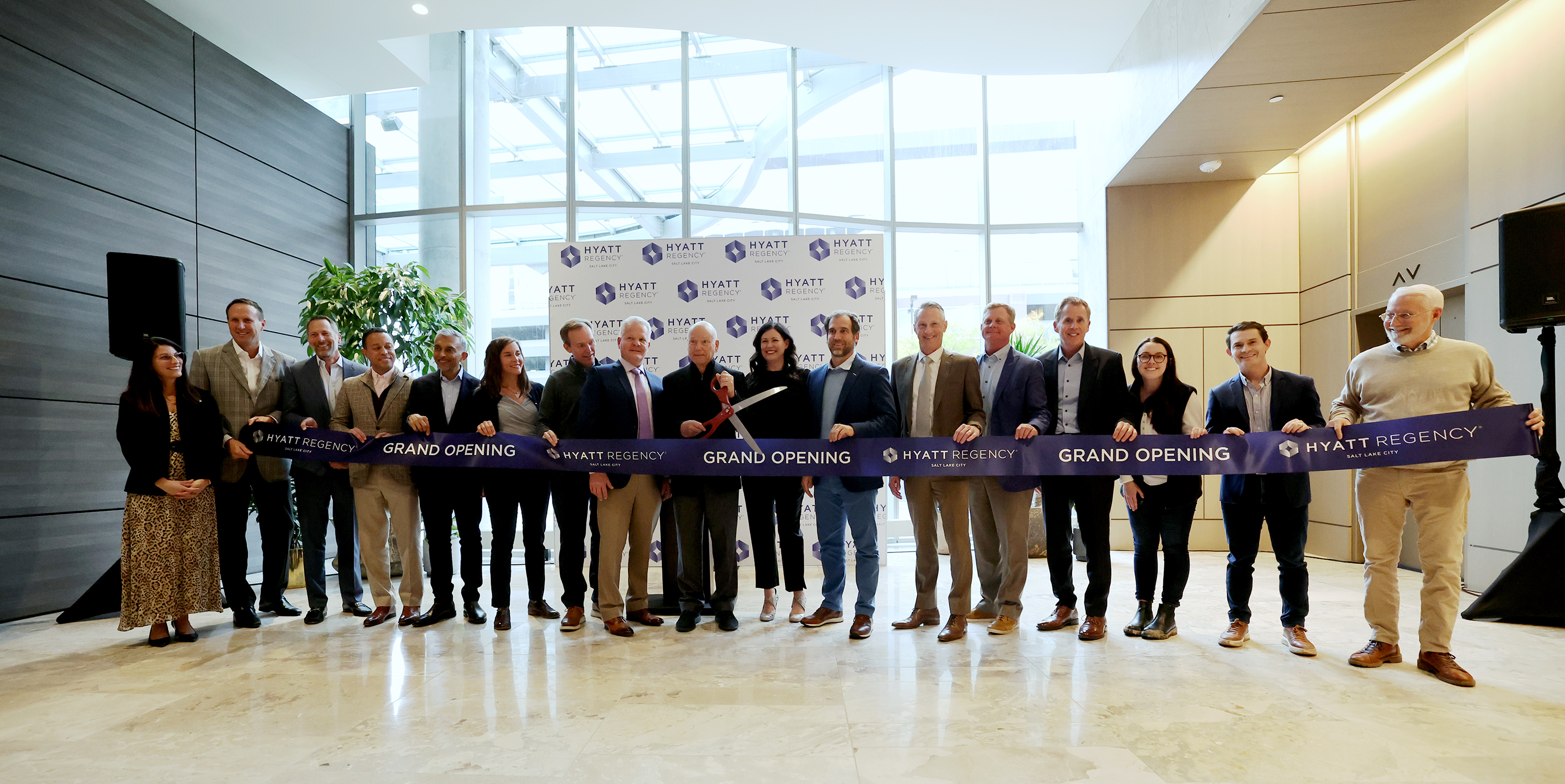 Officials cut the ribbon at the newly opened Hyatt Regency hotel in Salt Lake City on Wednesday, Nov. 2, 2022.