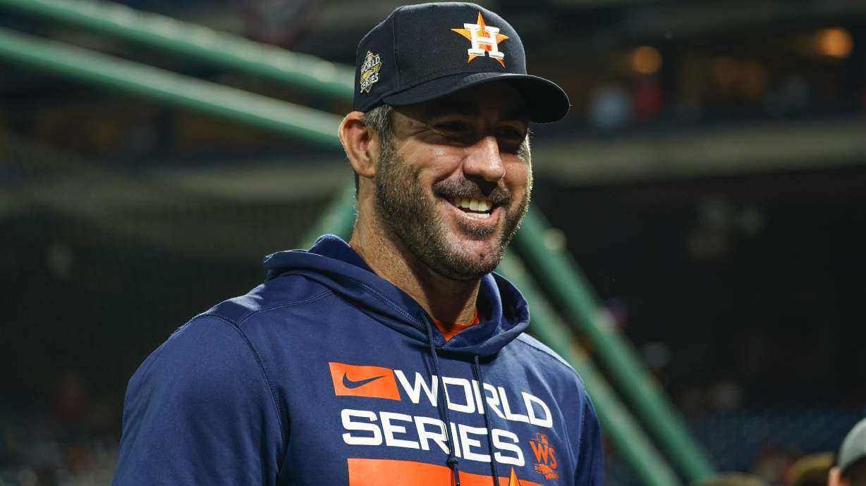Houston Astros starting pitcher Justin Verlander smiles before Game 3 of baseball's World Series between the Houston Astros and the Philadelphia Phillies on Tuesday, Nov. 1, 2022, in Philadelphia.