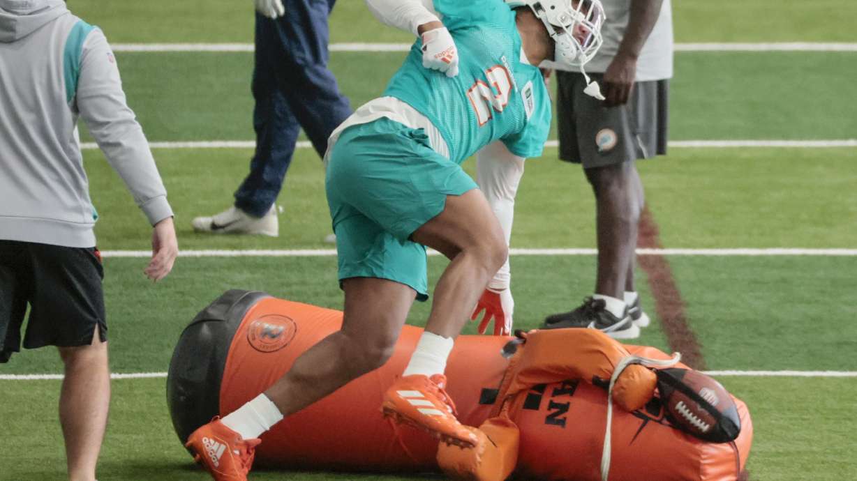 Miami Dolphins linebacker Bradley Chubb (2) runs through practice drills during NFL football practice in Miami Gardens, Fla., Wednesday, Nov. 2, 2022.
