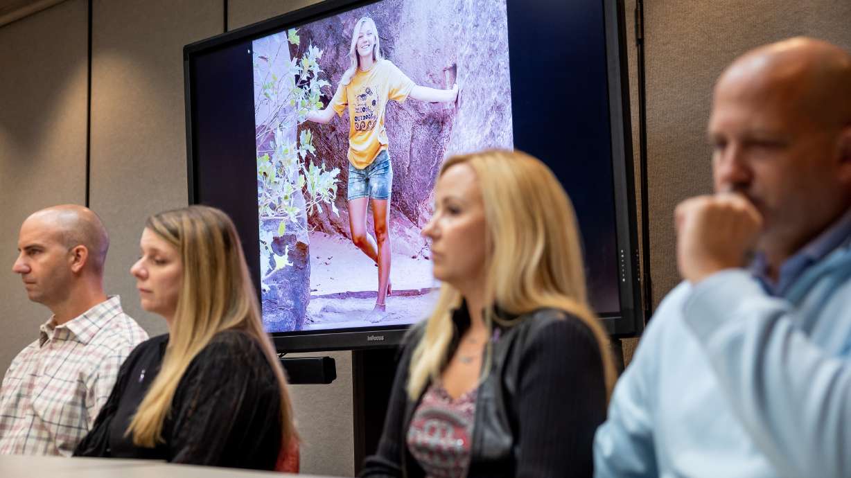 An image of Gabby Petito is shown on a screen as her parents take part in a press conference in Salt Lake City on Nov. 3, 2022. An appeal of a lawsuit Petito’s parents filed against the Moab police will be heard in the Utah Supreme Court on March 4.