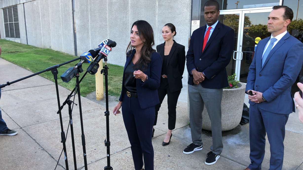 FILE - Attorney Alexandra Benevento, center, speaks with reporters during a news conference announcing a cheerleader abuse lawsuit filed in Tennessee on Tuesday, Sept. 27, 2022, in Memphis, Tenn. The American cheerleading company behind the sport’s top uniforms, camps and competitions is evaluating a possible defamation case against lawyers who have named the enterprise in a series of federal lawsuits alleging sexual abuse at gyms across the Southeast. In a letter sent Tuesday, Nov. 1, defamation attorney Thomas Clare accused civil rights attorney Bakari Sellers and lawyers with the Strom Law Firm of making false and defamatory statements about Varsity Spirit’s relationship to the alleged sexual abuse of cheerleaders by coaches at gyms in South Carolina, Tennessee and North Carolina.