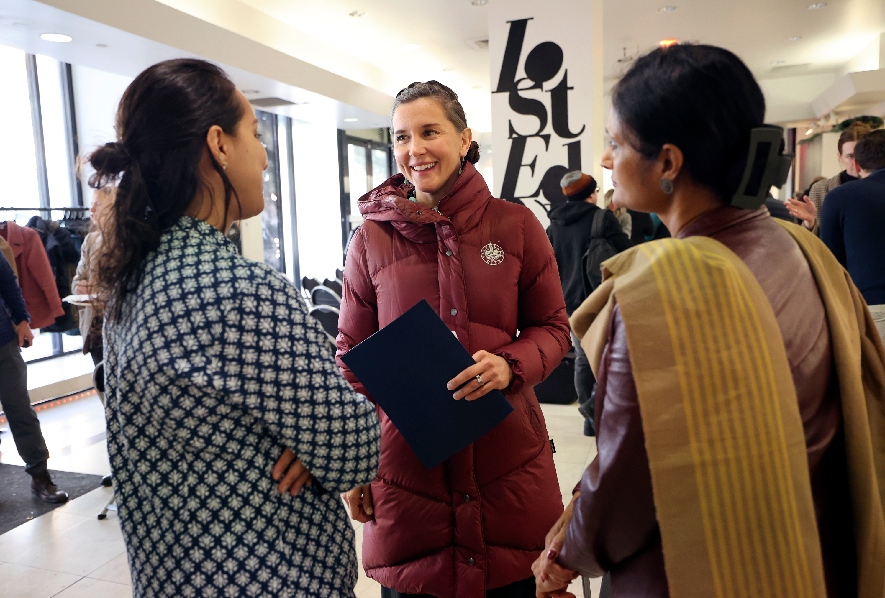 Sonali Loomba, Kaladharaa Dance owner and Indian classical dancer, left, Salt Lake City Mayor Erin Mendenhall and Srilatha Singh, Chitrakaavya Dance owner and Indian classical dancer and teacher, talk after a panel discussion about the future of art and technology on Thursday.
