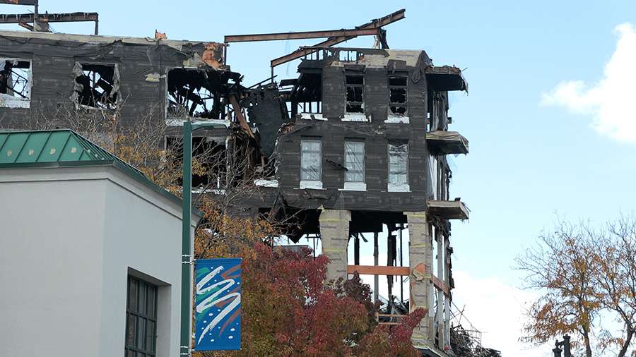 The apartment building caught fire on Oct. 26 and is yet to be demolished.