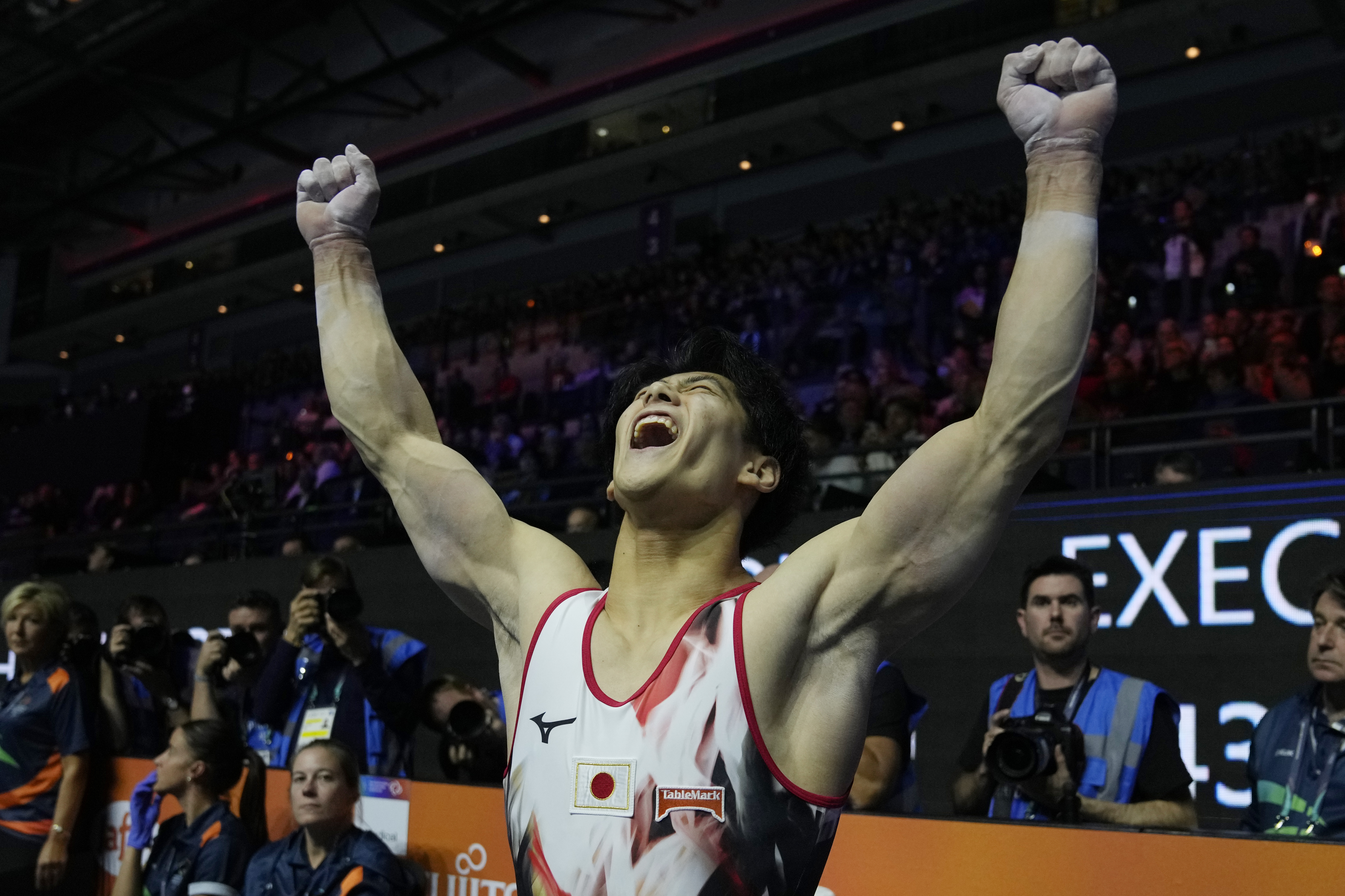 Daiki Hashimoto of Japan celebrates as he won the gold medal at the Men's All-Around Final during the Artistic Gymnastics World Championships at M&S Bank Arena in Liverpool, England, Friday, Nov. 4, 2022. 