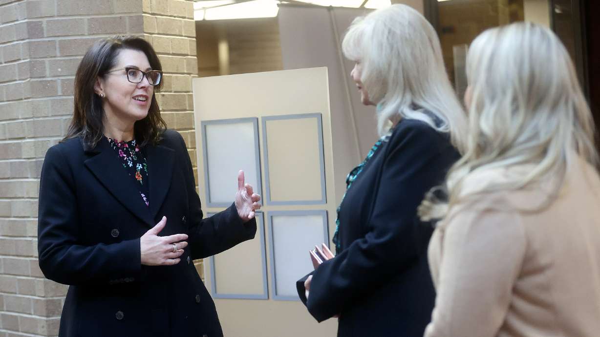 Lt. Gov. Deidre Henderson, left, talks with Salt Lake County Clerk Sherrie Swenson and Salt Lake County chief deputy clerk Lannie Chapman during early voting at the Salt Lake County Government Center in Salt Lake City on Thursday. Chapman is running to replace Swenson, who is retiring at the end of the year.