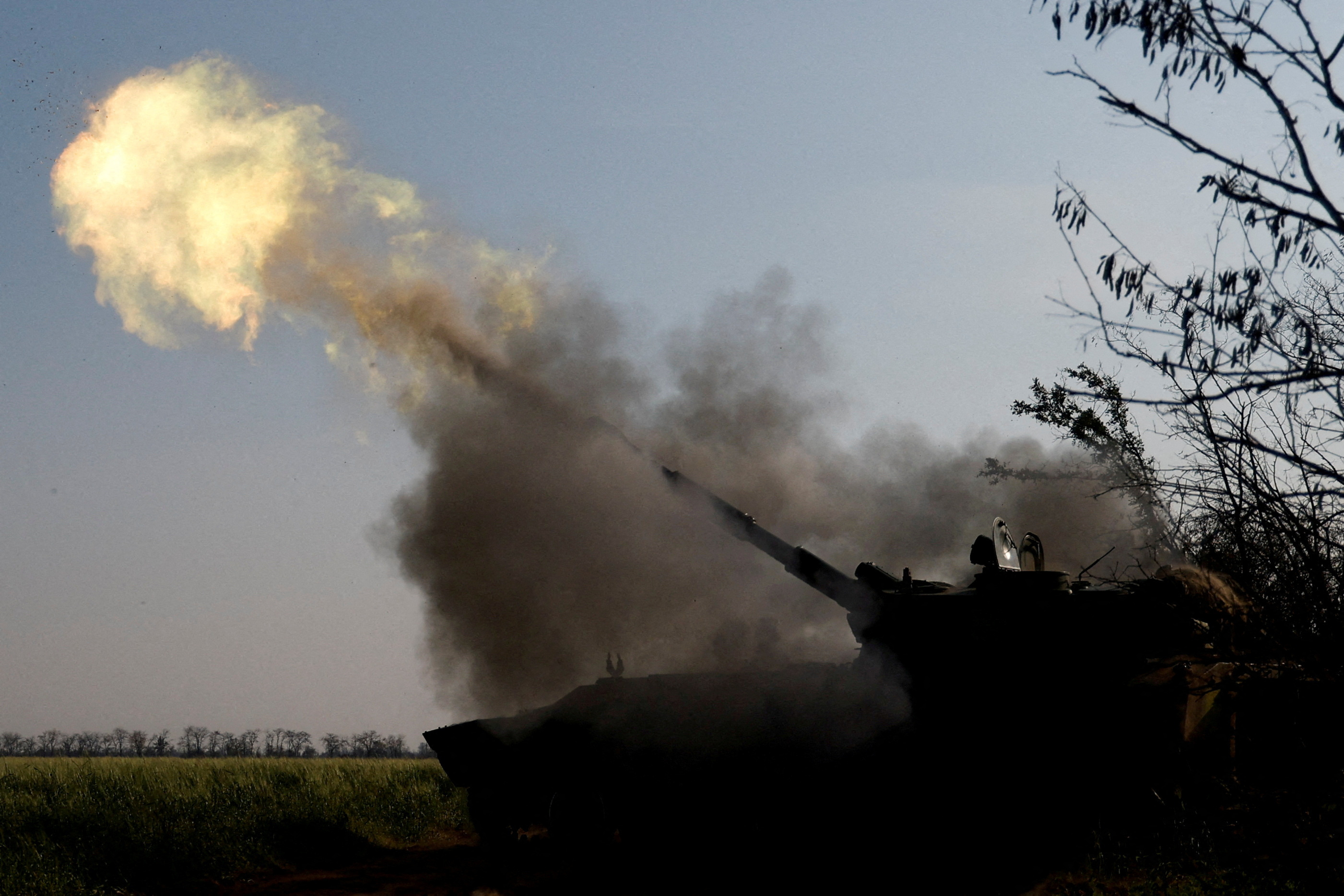 Ukrainian servicemen fire a self-propelled howitzer toward Russian positions, amid Russia's attack on Ukraine, on a frontline in Mykolaiv region, Ukraine Nov. 2
