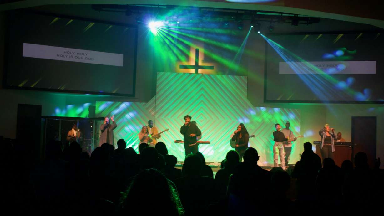 Musicians sing and play at a service celebrating the 100th birthday of the Point Church, previously called New Pilgrim Baptist Church, on Sunday, Oct. 30.