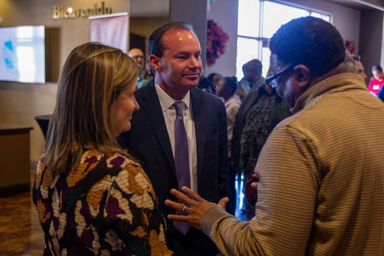 Pastor Corey J. Hodges speaks with Sen. Mike Lee and Salt Lake County Mayor Jenny Wilson at a service celebrating the 100th birthday of The Point Church, previously called New Pilgrim Baptist Church, on Oct. 30.